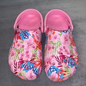 pink floral patterned crocs